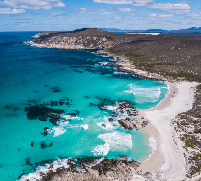 drone image of blue water and rugged coastline of Fitzgerald River National Park to show epic beaches
