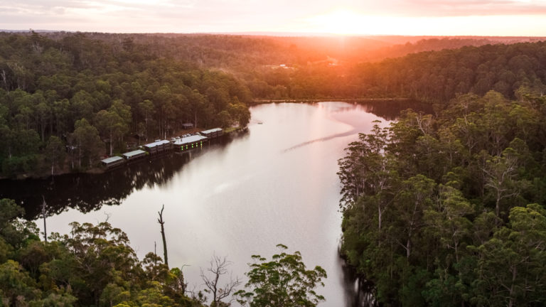 drone image of lake beedelup in pemberton at sunset to show beauty of landscapes on the south west edge road trip