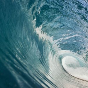 A close up image of a tunnel surf wave in Margaret River shows this is a world renowned surfing destination along The South West Edge