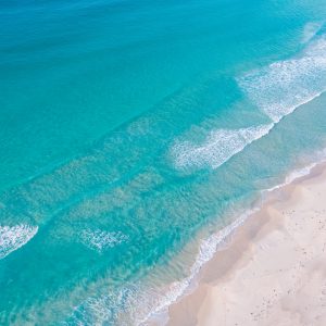 drone image of pristine blue waters and white sand to show beaches on the south west edge road trip