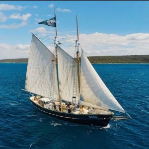drone image of pearl lugger sail boat Willie Cruises to show tour operator en route along The South West Edge